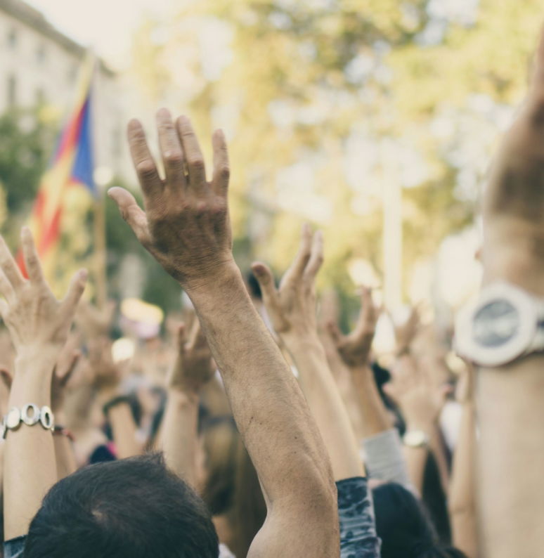 group-of-people-raising-their-hands.jpg group of people raising their hands